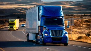 Blue commercial truck on the road